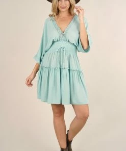 LOVESTITCH Lace Trimmed V-Neck Mini Dress Skirts & Dresses