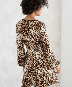 LOVESTITCH Leopard Print Long Sleeve Peasant Mini Dress Skirts & Dresses