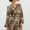 LOVESTITCH Leopard Print Long Sleeve Peasant Mini Dress Skirts & Dresses